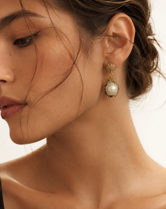 Side view of tourmaline earrings catching delicate reflections