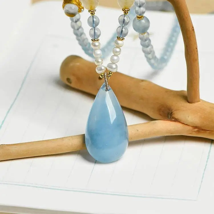 Elegant Aquamarine Drop Necklace for Timeless Style Crystal Country Arts and Crafts