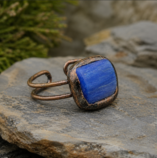 Blue stone ring with vintage blue ring character, organic texture, and quiet statement presence.