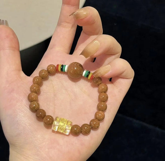 Handmade Red Glass Bead Bracelet with Gold Charm Lichen Arts and Crafts