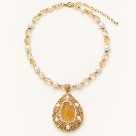Golden Hour citrine necklace with teardrop pendant, pearl accents, beaded strand, clasp, and extender chain