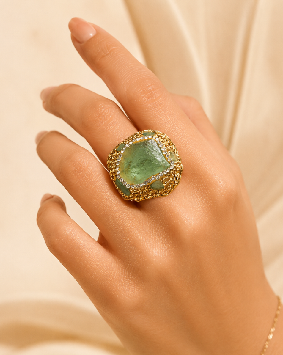 Artistic green yellow crystal ring for women with botanical warmth, soft sparkle, and a luxury healing jewelry mood.