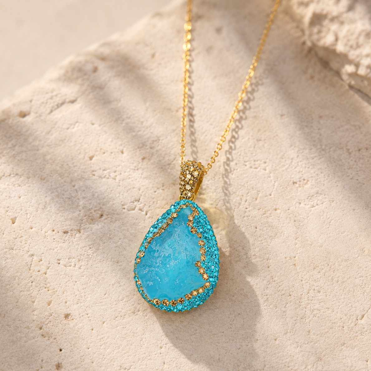 Crystal jewelry set displayed on natural stone surface