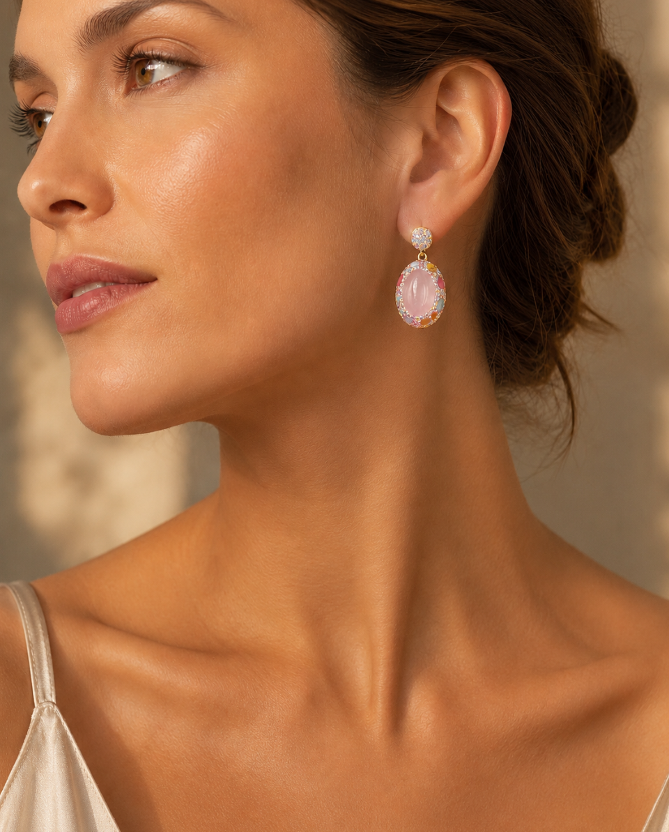Healing crystal earrings designed as soft pink jewelry with tender color, feminine glow, and graceful drop shape.