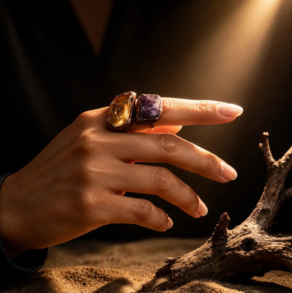 Amethyst ring paired with a citrine ring mood, creating rich violet and amber gemstone contrast.