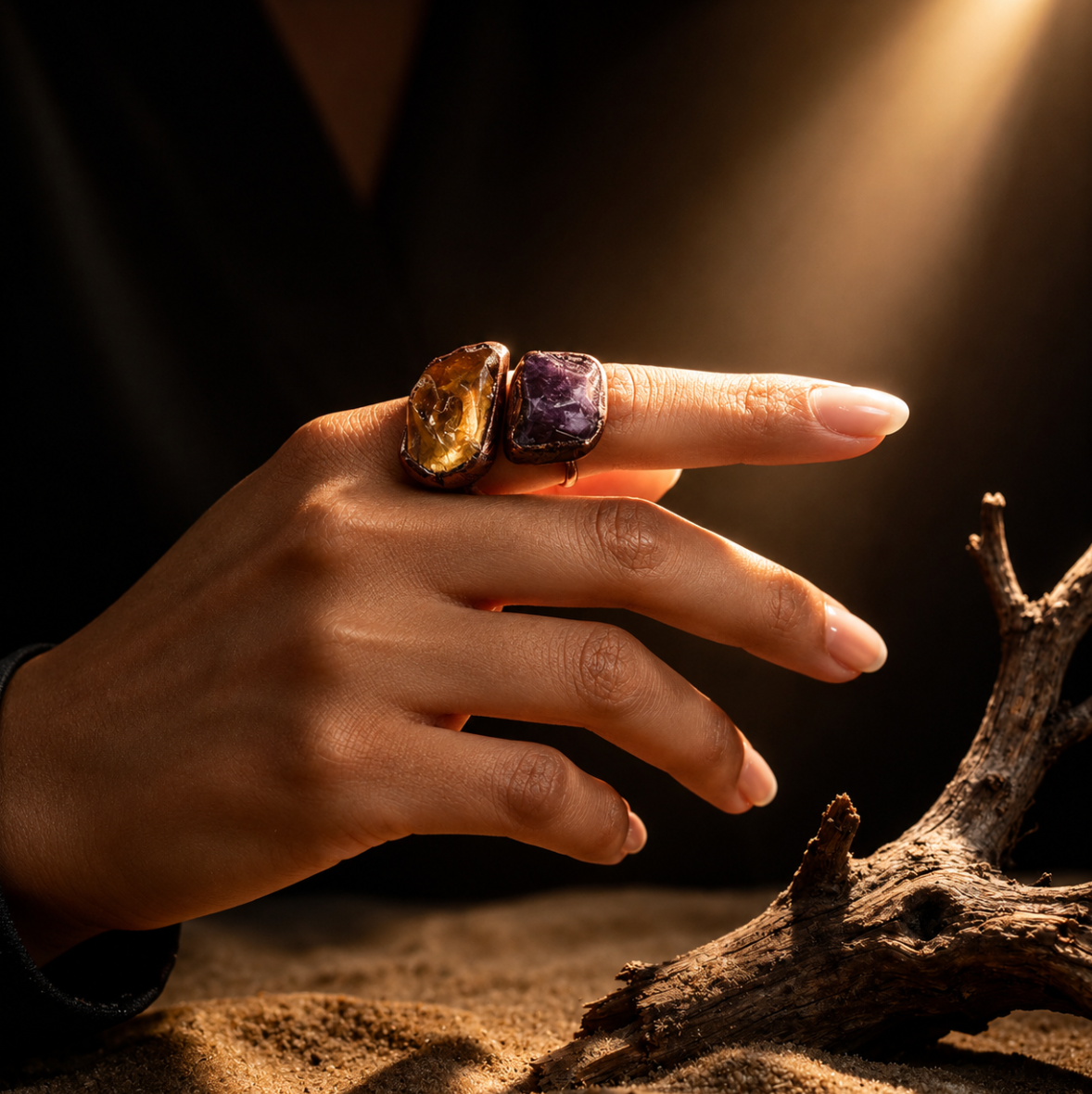 Amethyst ring paired with a citrine ring mood, creating rich violet and amber gemstone contrast.