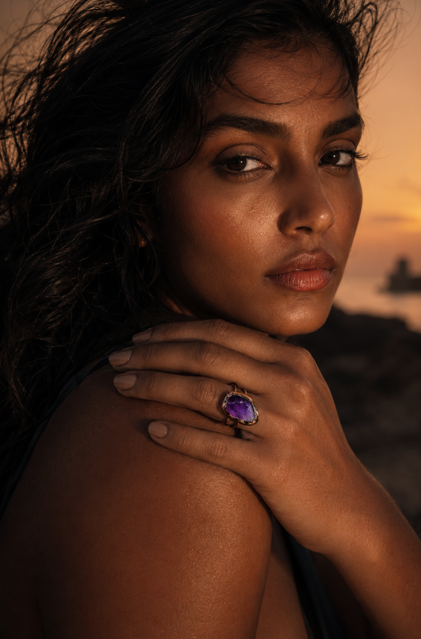 Purple gemstone ring with raw amethyst ring texture and refined statement silhouette.