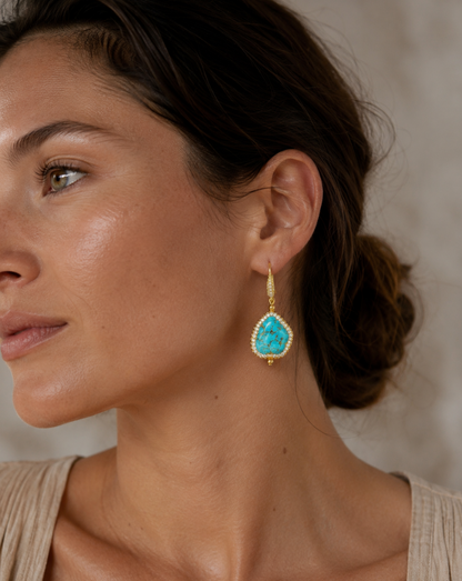 Pearl jewelry set with blue-green turquoise stones, organic pearl texture, and elegant vacation-inspired style.