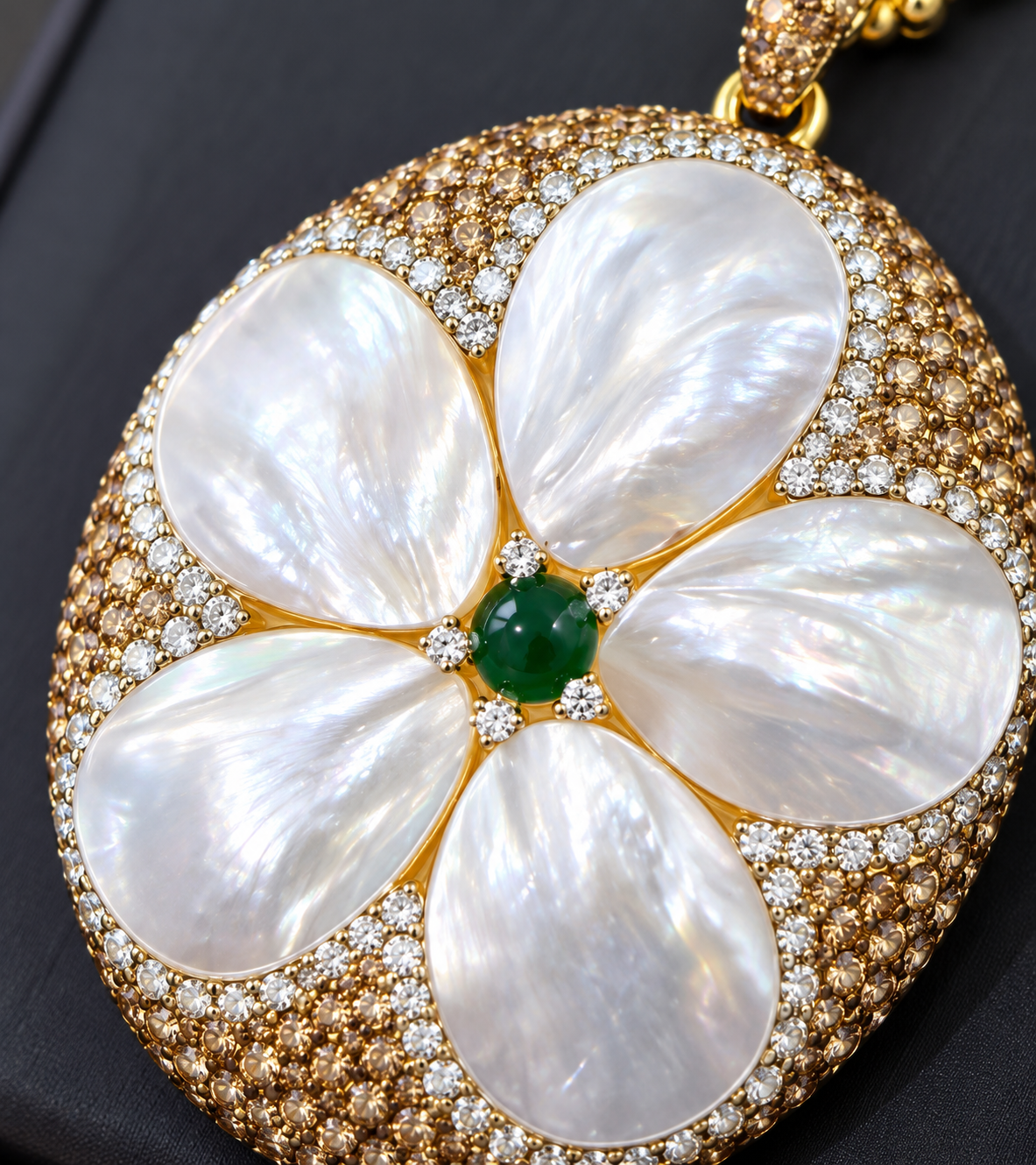 Close-up detail of the Tidebloom Floral Shell Necklace with five iridescent shell petals and green center