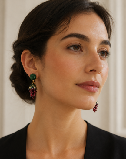 Delicate garnet earrings capturing the rich glow of deep red gemstones