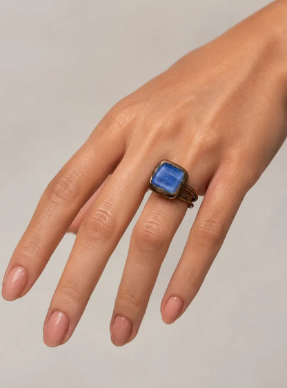Boho blue ring with blue birthstone ring mood, artistic shape, and deep ocean-like color.