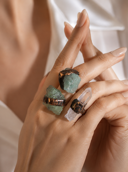Clear quartz green fluorite ring with raw transparent crystal, green fluorite stones, and organic open design.