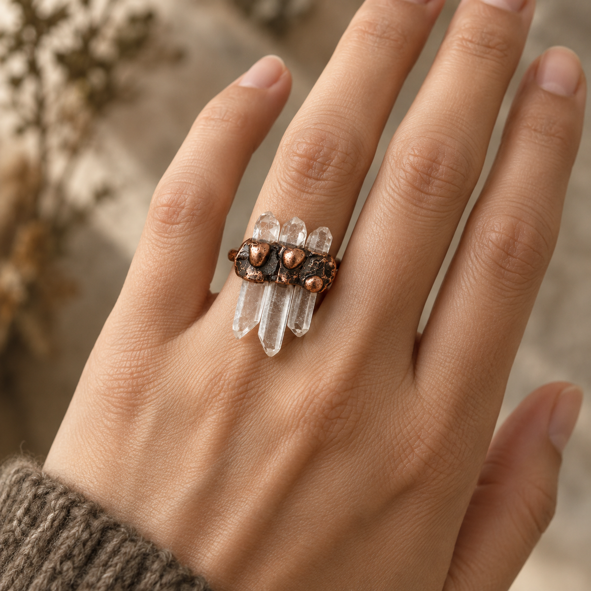 Moonlit Clear Quartz Ring worn on a hand showing its vertical clear crystal composition