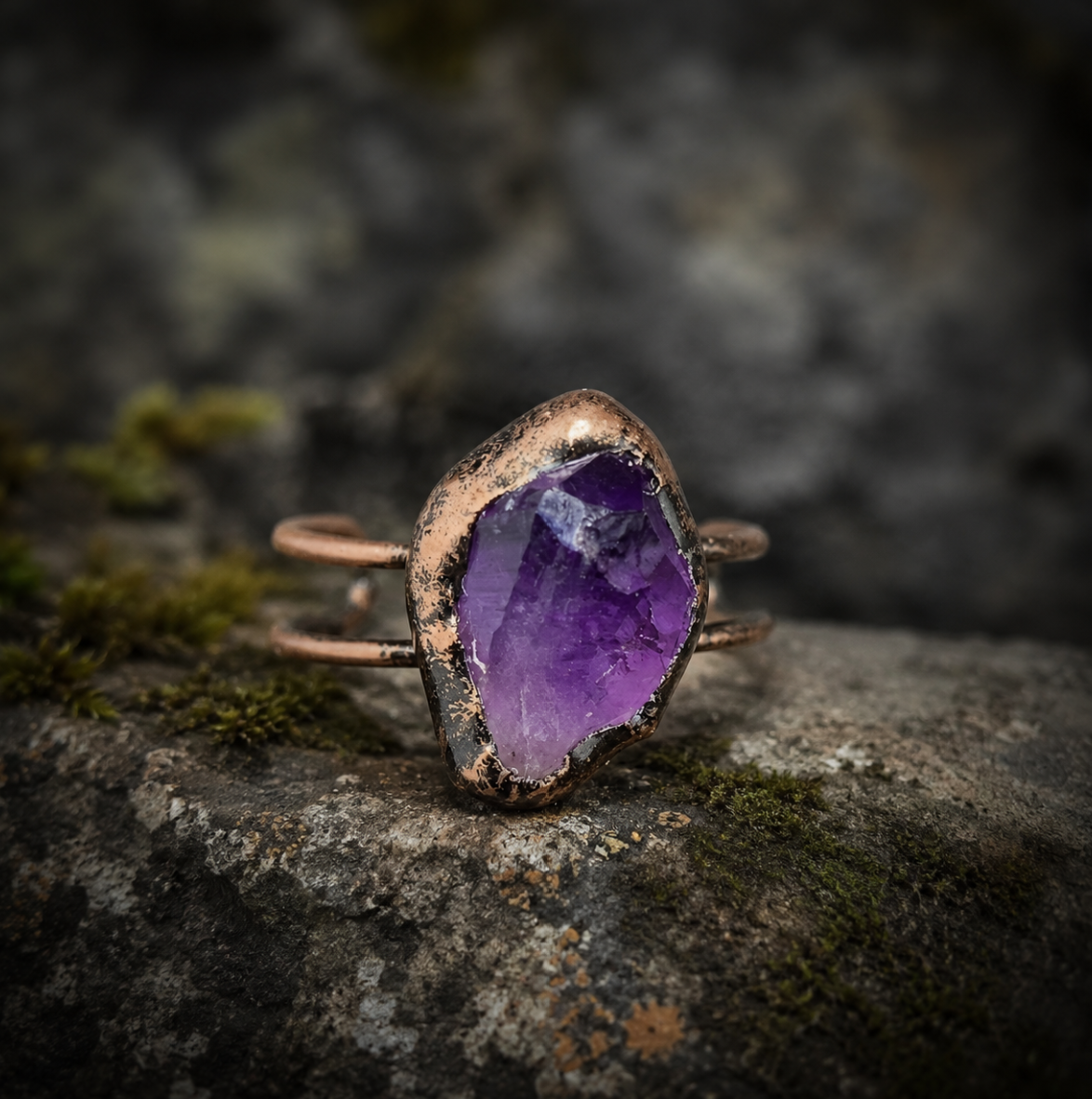 Natural amethyst ring with raw amethyst surface, sculptural shape, and earthy elegance.