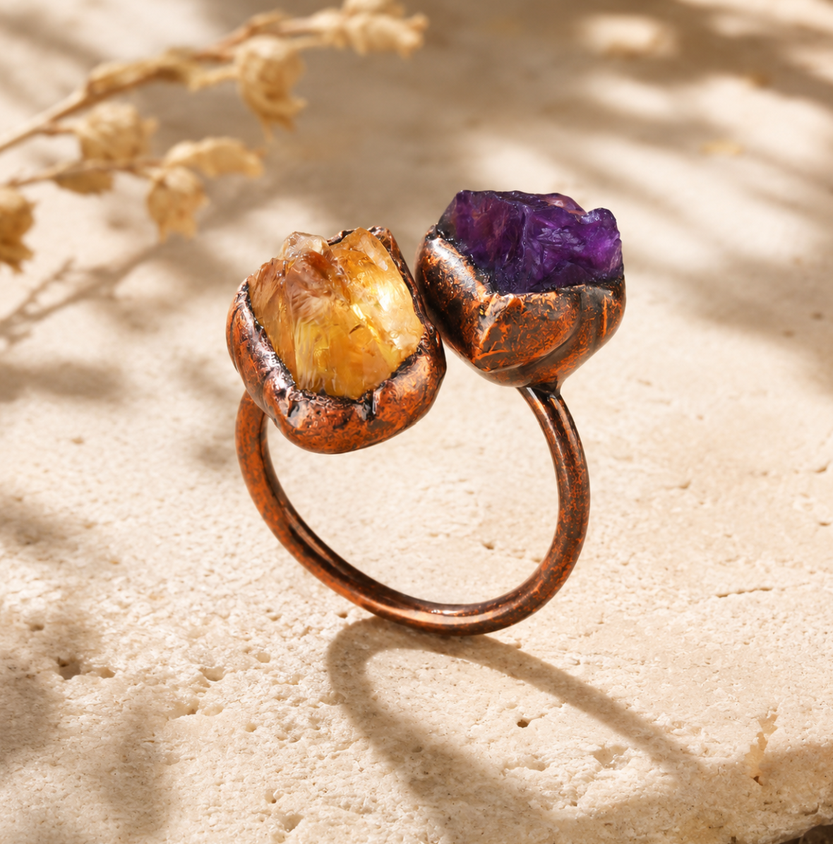 Bi color gemstone ring featuring purple amethyst and yellow citrine in a refined statement silhouette.