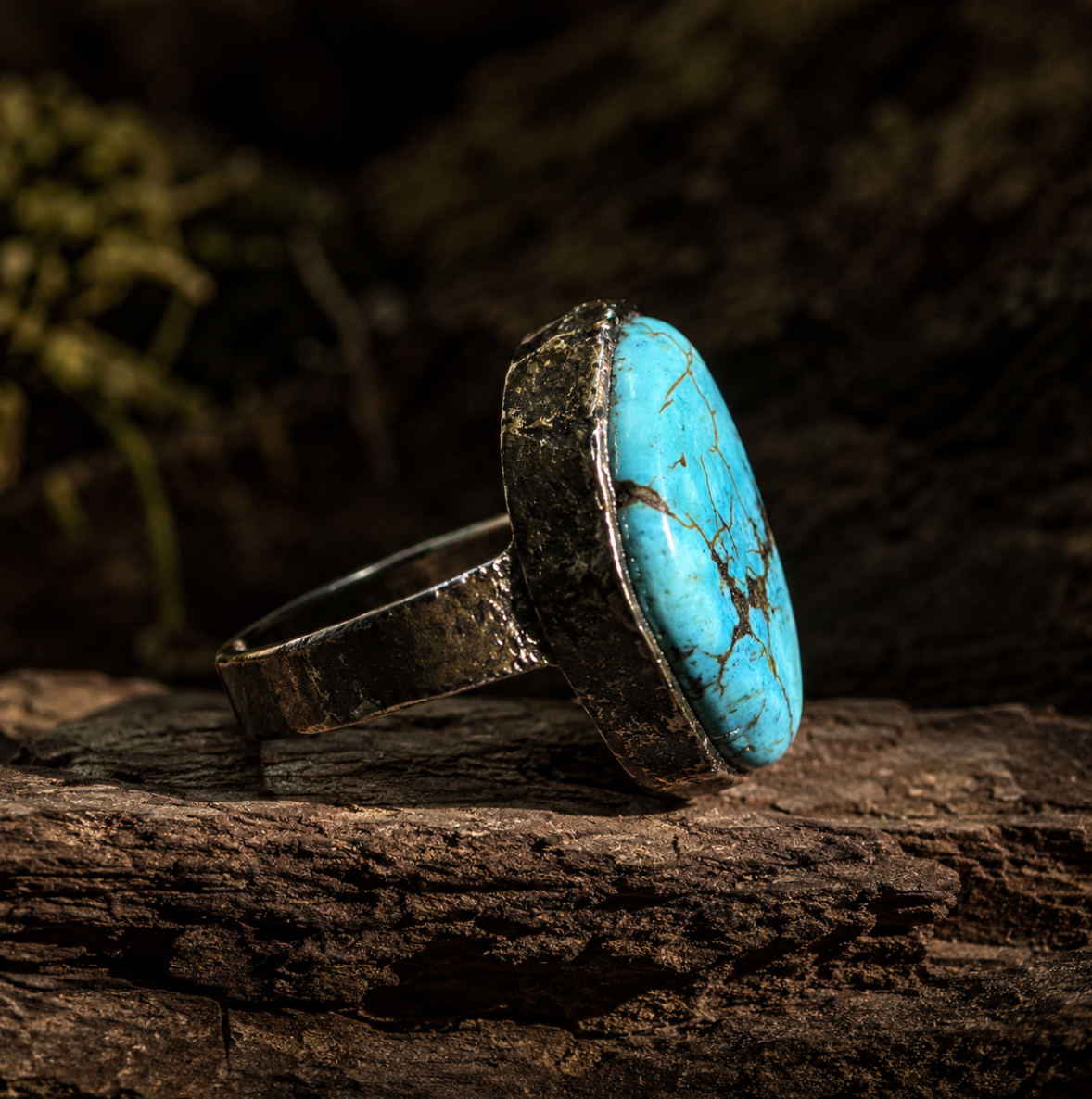 Southwestern turquoise ring inspired design with bold stone face and collected vintage character.
