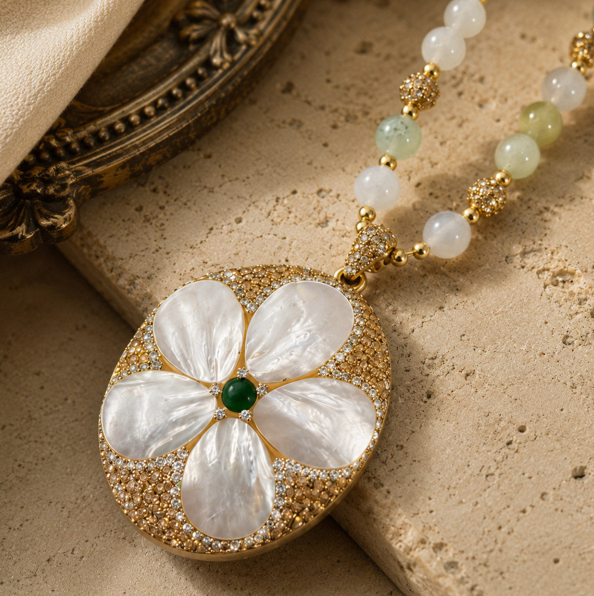 Elegant seashell pearl necklace displayed on natural stone with warm neutral tones and coastal jewelry styling.
