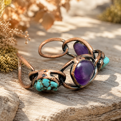 Multi stone bracelet featuring amethyst, turquoise, organic shapes, and artistic handcrafted styling.