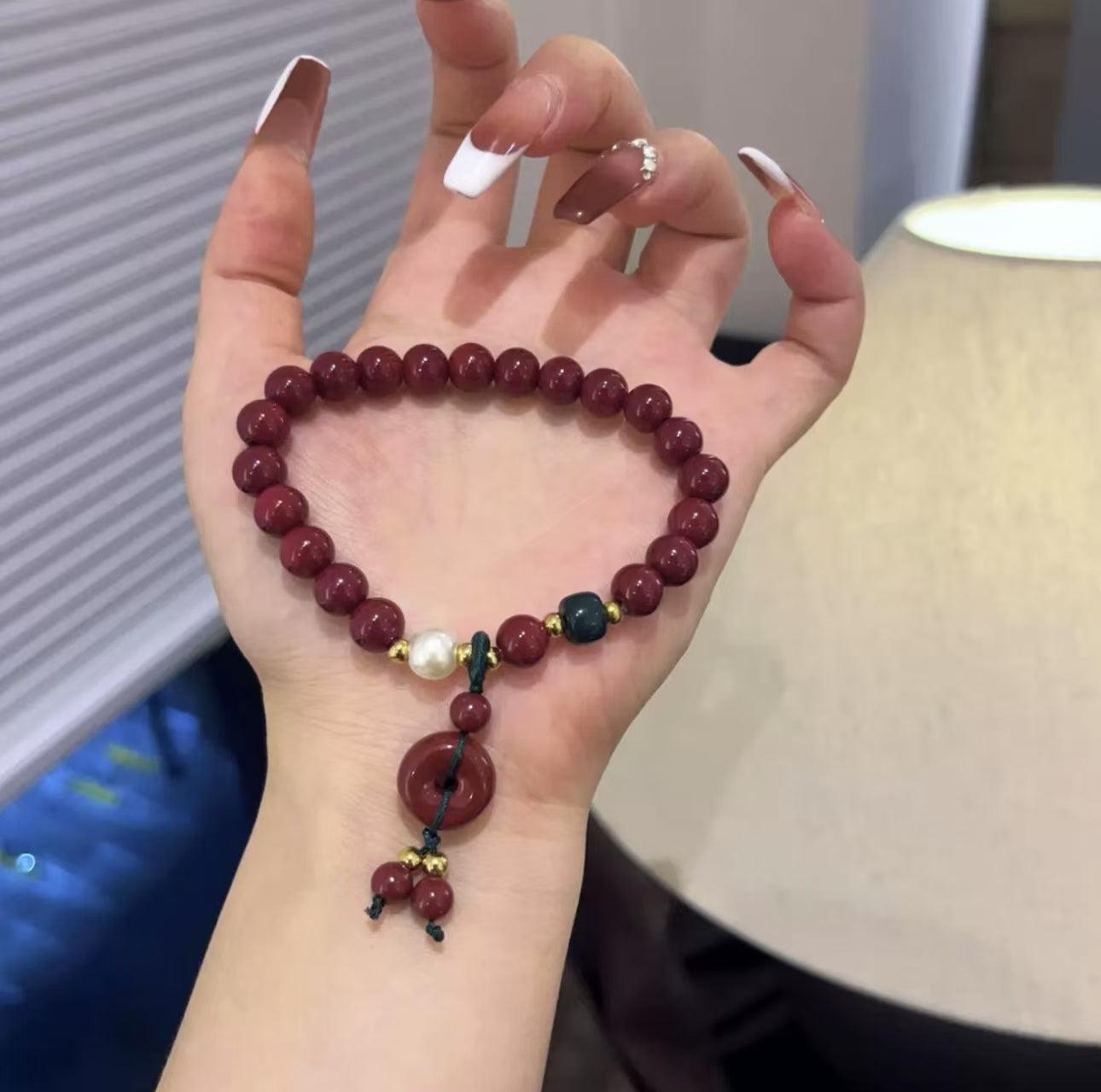 South Red Peace Button Glass Hand Bead Boudoir Bracelet with red glass beads and gold/green accents